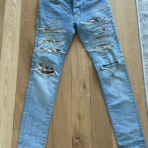 AMIRI Men's Distressed cheetah patch jeans VERY RARE